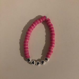 Pink “HAPPY” clay bead braclett